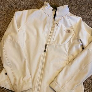 Cream colored north face jacket